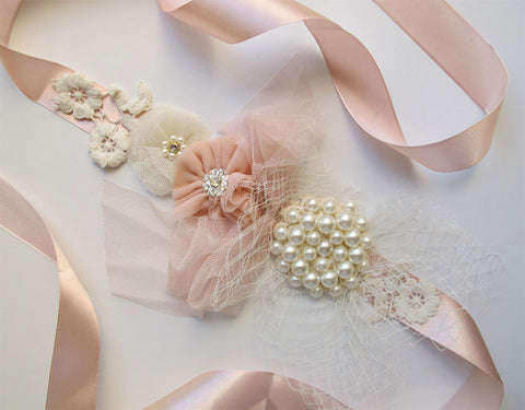 Ivory & pink sash with flower and pearls