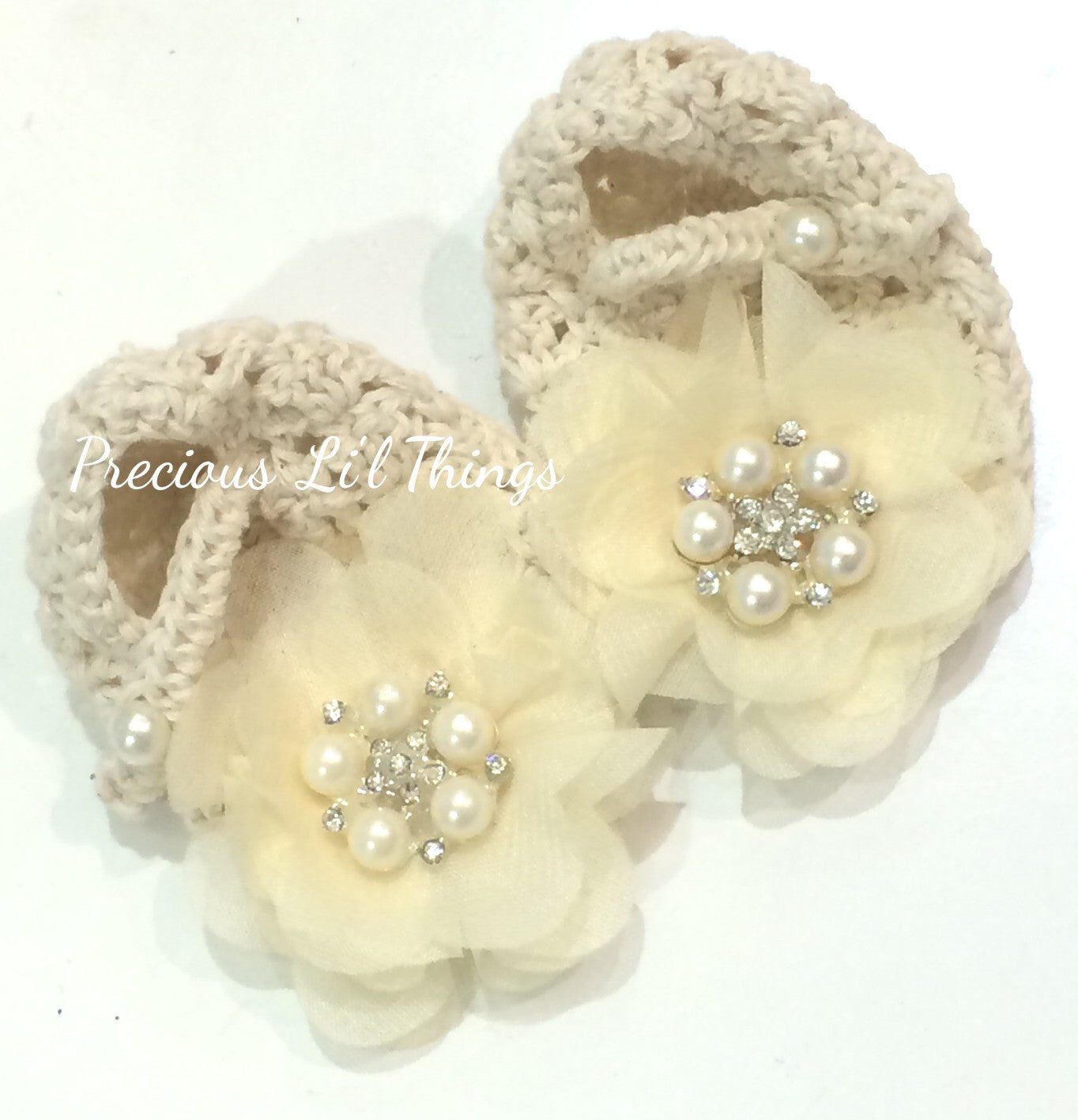 Newborn to one year beige crochet flower booties