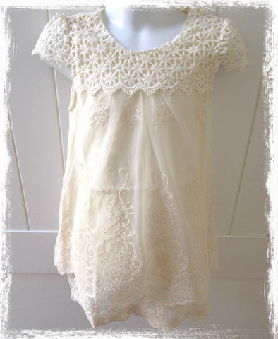 Ivory crochet and embroidered dress.